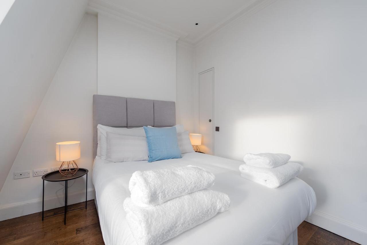 Grosvenor Gardens By Capital Apartment London Bagian luar foto